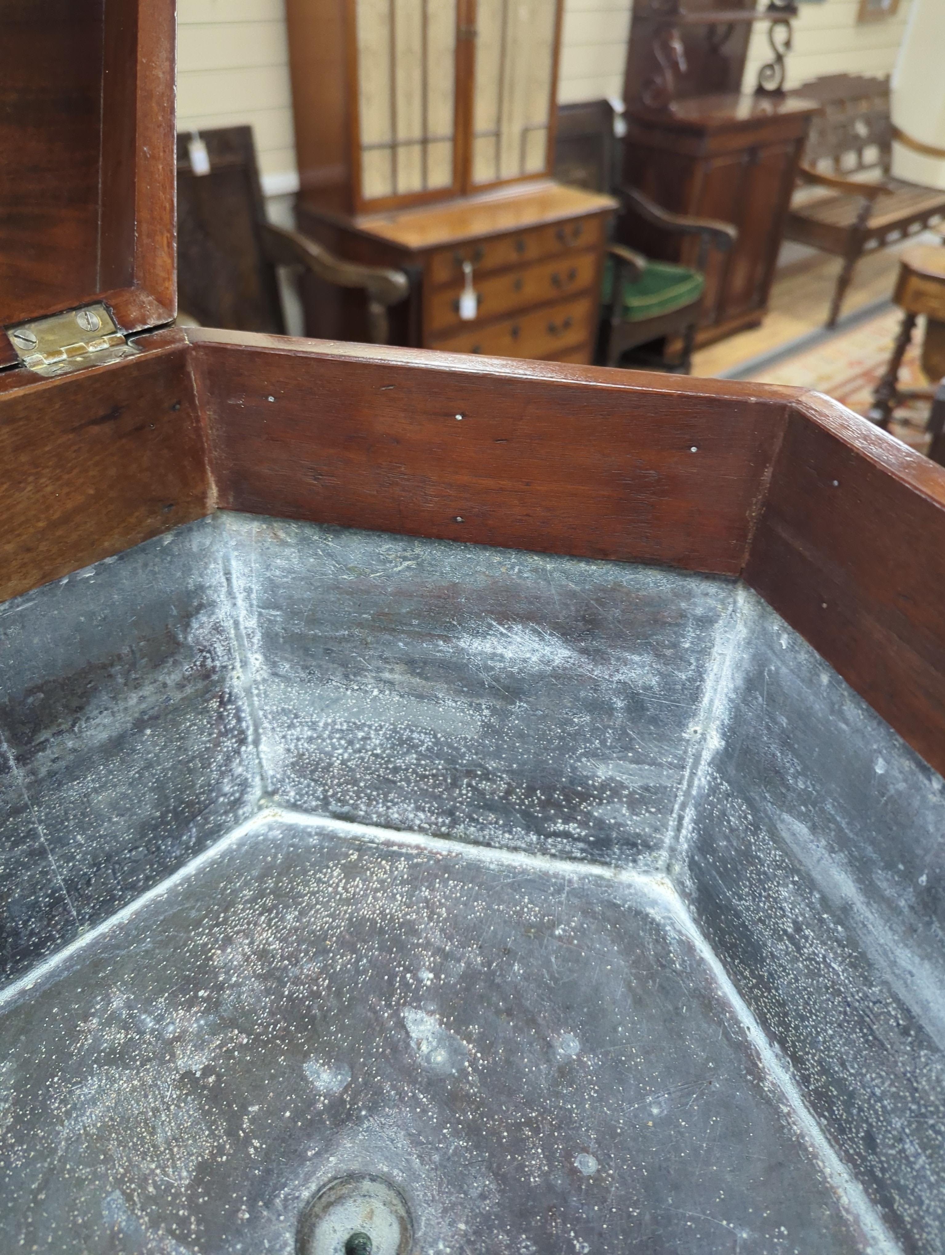 A George III hexagonal brass-bound wine cooler, width 48cm, height 66cm